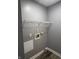 Laundry room featuring white shelving and utility hookups, ready for appliances at 8445 Montery Rd, Indianapolis, IN 46226