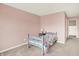 Small bedroom featuring a single bed and a gray nightstand at 848 Silverheels Dr, Westfield, IN 46074