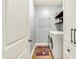 Well-organized laundry room with modern appliances and storage shelves at 848 Silverheels Dr, Westfield, IN 46074