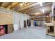 Unfinished basement with workbench, storage, and pegboard provides ample space for projects at 8619 Wrangler Ct, Indianapolis, IN 46217
