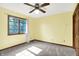 Bright bedroom with natural light from the window and neutral carpet at 8619 Wrangler Ct, Indianapolis, IN 46217