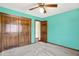 Bedroom with a closet and an open door to another room at 8619 Wrangler Ct, Indianapolis, IN 46217