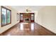 Spacious living room featuring a brick fireplace with large windows at 8619 Wrangler Ct, Indianapolis, IN 46217