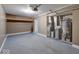 Unfinished basement space with storage shelves and utilities, ready for customization and remodeling at 9054 Cornucopia Dr, Indianapolis, IN 46268