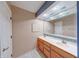 Bathroom showcasing double vanity, decorative mirror, and modern fixtures at 9054 Cornucopia Dr, Indianapolis, IN 46268