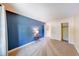 Bedroom with plush carpeting, stylish accent wall, and closet space at 9054 Cornucopia Dr, Indianapolis, IN 46268