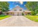 Attractive townhome showcasing well-kept lawns and a convenient two-car driveway at 9054 Cornucopia Dr, Indianapolis, IN 46268