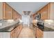 Spacious kitchen with granite countertops, stainless steel appliances, and ample cabinet space at 9054 Cornucopia Dr, Indianapolis, IN 46268