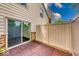 A private outdoor patio with sliding glass door access, perfect for relaxation and outdoor living at 9054 Cornucopia Dr, Indianapolis, IN 46268