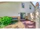 Private patio with space for seating, surrounded by lush greenery, offering a peaceful retreat at 9054 Cornucopia Dr, Indianapolis, IN 46268