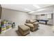 Finished basement with play area, comfortable seating, and recessed lighting at 9221 Holyoke Ct, Indianapolis, IN 46268