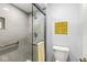 Bathroom with glass shower, grab bar, and tile surround for a clean, modern look at 9221 Holyoke Ct, Indianapolis, IN 46268