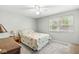 Comfortable bedroom with carpet flooring, natural light, and a cozy, inviting atmosphere at 9221 Holyoke Ct, Indianapolis, IN 46268