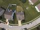 Birds eye view of the homes, manicured lawns, and surrounding neighborhood at 9704 Gull Lake Dr, Indianapolis, IN 46239