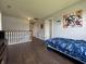 This bedroom features superhero artwork on the walls and blue bedding at 9704 Gull Lake Dr, Indianapolis, IN 46239