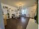 Bright and spacious flex room with hardwood flooring, large windows, and stylish decor at 9704 Gull Lake Dr, Indianapolis, IN 46239