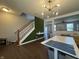 Inviting flex room with hardwood floors, modern lighting, and an open layout for flexible use at 9704 Gull Lake Dr, Indianapolis, IN 46239