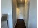 Hallway with white doors leading to other rooms in the house at 9704 Gull Lake Dr, Indianapolis, IN 46239