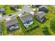 Aerial view of a home with a manicured lawn, fenced backyard with a patio and outdoor seating area at 9716 Cimmaron Ave, McCordsville, IN 46055