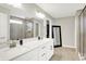 Modern bathroom with double vanity, walk-in shower, and sleek fixtures at 9716 Cimmaron Ave, McCordsville, IN 46055