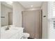 Bright bathroom featuring a vanity with a sink and shower with curtain at 9716 Cimmaron Ave, McCordsville, IN 46055