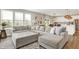 Spacious living room with a large sectional couch, neutral tones, and seamless flow to the kitchen and dining area at 9716 Cimmaron Ave, McCordsville, IN 46055