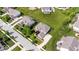 Residential home with a well-manicured lawn and mature trees at 10054 Win Star Way, Fishers, IN 46040