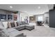 Spacious finished basement with comfortable seating, game tables, and movie memorabilia at 10054 Win Star Way, Fishers, IN 46040
