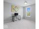 This bedroom provides a desk area near the window to get some work done while enjoying the view at 10054 Win Star Way, Fishers, IN 46040
