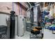 Basement utility room featuring a water heater, water softener and furnace at 10054 Win Star Way, Fishers, IN 46040