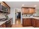 Modern kitchen featuring updated stainless steel appliances and countertops at 102 Roxbury Ln, Noblesville, IN 46062