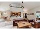Open living area with a view of the kitchen, offering a seamless flow at 102 Roxbury Ln, Noblesville, IN 46062