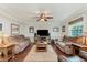 Spacious living room with hardwood flooring and comfortable seating at 102 Roxbury Ln, Noblesville, IN 46062
