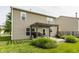 A well-manicured backyard features a pergola-covered deck and mature landscaping at 10273 Haag Rd, Brownsburg, IN 46112