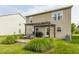 A well-manicured backyard features a pergola-covered deck and mature landscaping at 10273 Haag Rd, Brownsburg, IN 46112