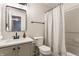 The bathroom offers a shower/tub combination with updated vanity and light fixtures at 10273 Haag Rd, Brownsburg, IN 46112