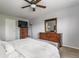 Spacious bedroom with two dressers, neutral colors, and ample natural light at 10273 Haag Rd, Brownsburg, IN 46112