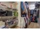 Walk-in closet with wire shelving, full of clothing items and accessories at 10273 Haag Rd, Brownsburg, IN 46112