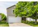 Charming two-story home with attached garage and mature landscaping at 10273 Haag Rd, Brownsburg, IN 46112