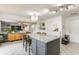 Open-concept kitchen with stainless steel appliances and a large island at 10273 Haag Rd, Brownsburg, IN 46112