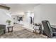 Open living space featuring neutral walls, tile flooring, and a view of the staircase at 10273 Haag Rd, Brownsburg, IN 46112