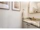 Elegant powder room featuring granite countertops and modern fixtures at 10273 Haag Rd, Brownsburg, IN 46112