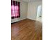 Cozy living room with hardwood floors and natural light at 1030 N Concord N St, Indianapolis, IN 46222