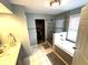 This bathroom features an enclosed walk-in shower, a soaking tub, and an adjacent walk-in closet at 10760 Independence Way, Carmel, IN 46032