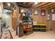 Unfinished basement with storage shelves and work area at 1102 Clearwell Dr, Greenwood, IN 46143