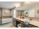 Bathroom with double sinks, a large mirror, and a separate tub and shower at 1102 Clearwell Dr, Greenwood, IN 46143