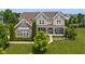 Charming two-story home with a well-manicured lawn, beautiful landscaping, and inviting front porch at 1102 Clearwell Dr, Greenwood, IN 46143