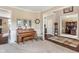 Cozy living room featuring hardwood floors, a decorative piano, and neutral wall colors at 1102 Clearwell Dr, Greenwood, IN 46143