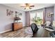 Home office space featuring a desk, chair, and natural light at 1102 Clearwell Dr, Greenwood, IN 46143