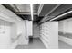 Spacious basement area with organized shelving perfect for storage at 11035 W Lakeshore Dr, Carmel, IN 46033